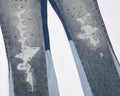 Jeans Flare Azzurro con Schizzi di Vernice