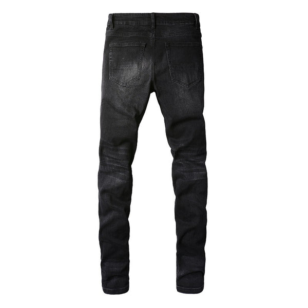 Jeans in Denim Nero con Strappi in pelle RossiUomo