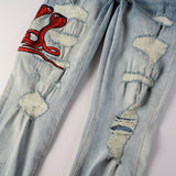 Jeans in denim Azurro Snake Slim Fit con Serpenti Rossi