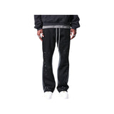 Pantaloni in Tuta Nera Flare di Cotone con schizzi di Vernice Uomo2