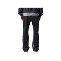 Pantaloni in Tuta Nera Flare di Cotone con schizzi di Vernice Uomo3