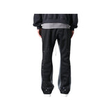 Pantaloni in Tuta Nera Flare di Cotone con schizzi di Vernice Uomo3