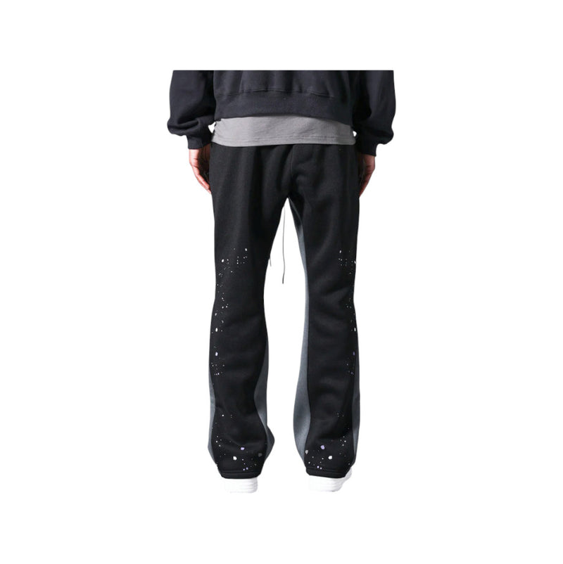 Pantaloni in Tuta Nera Flare di Cotone con schizzi di Vernice Uomo3