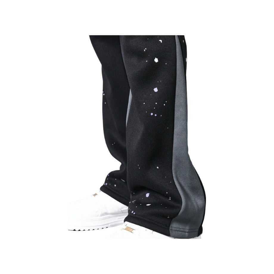 Pantaloni in Tuta Nera Flare di Cotone con schizzi di Vernice Uomo4