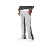 Pantaloni in Tuta Nera Flare di Cotone con schizzi di Vernice Uomo5