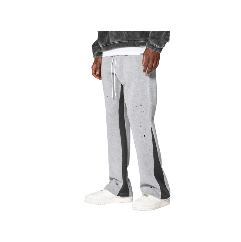 Pantaloni in Tuta Nera Flare di Cotone con schizzi di Vernice Uomo5