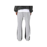 Pantaloni in Tuta Nera Flare di Cotone con schizzi di Vernice Uomo7