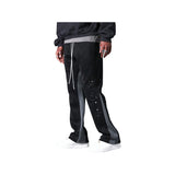 Pantaloni in Tuta Nera Flare di Cotone con schizzi di Vernice Uomo